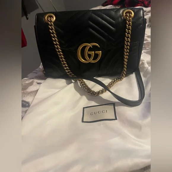 Gucci - Picture 1 of 2